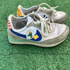 Nike Kids White, Blue & Gray Sneakers with Playful Patch